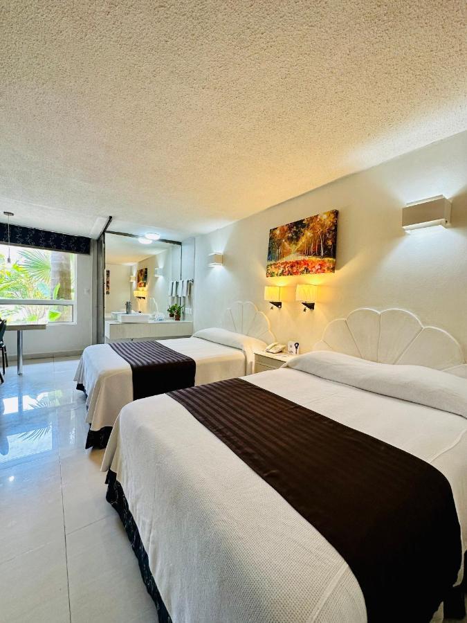 Hotel Plaza Caribe Cancun Exterior photo